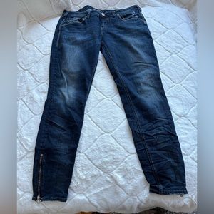 Silver Aiko fluid jeans have zipper on bottoms